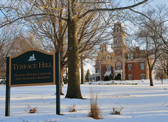 Terrace Hill and snow-covered north lawn in the winter.