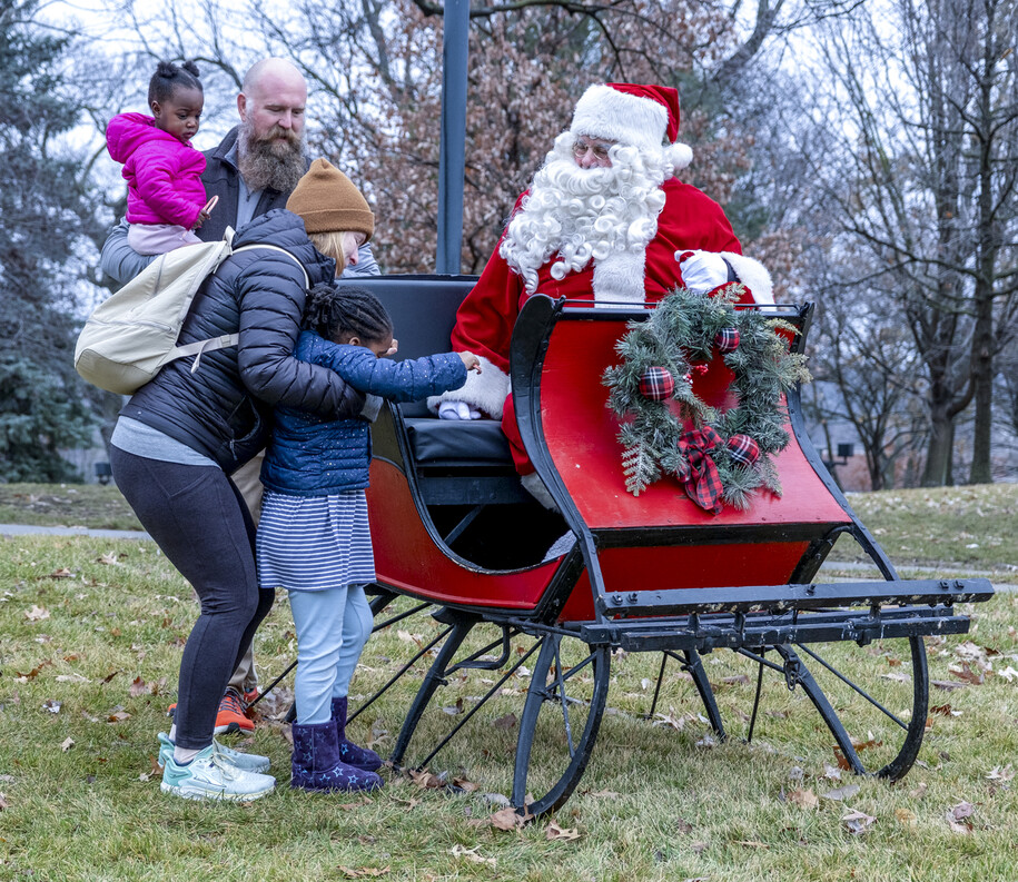 Santa, reindeer, sleigh, and guests